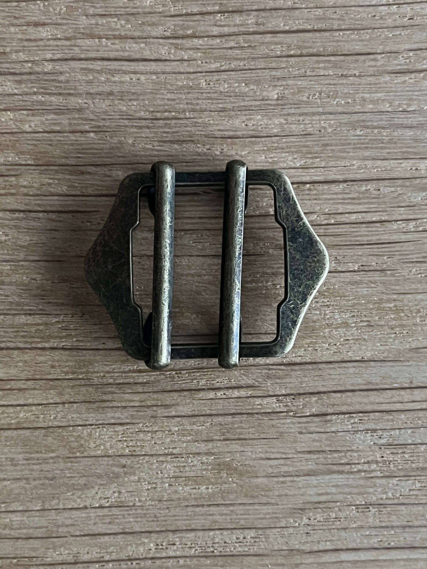 dubbele gespsluiting voor broek antiek brons voorkant